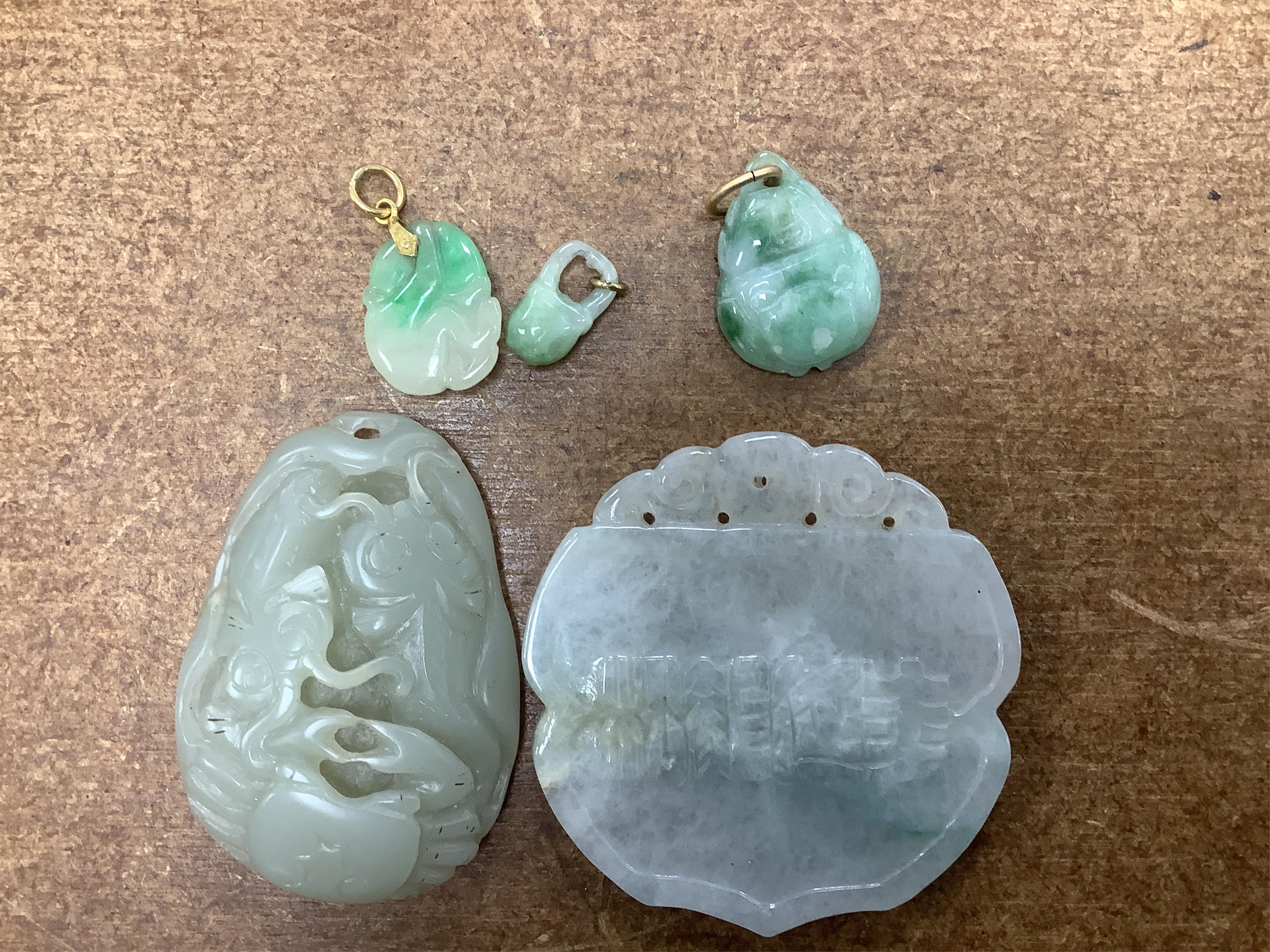 Sixteen Chinese jade and hardstone carvings, including a gilded white metal and jadeite bracelet, three pendants etc. Condition - fair